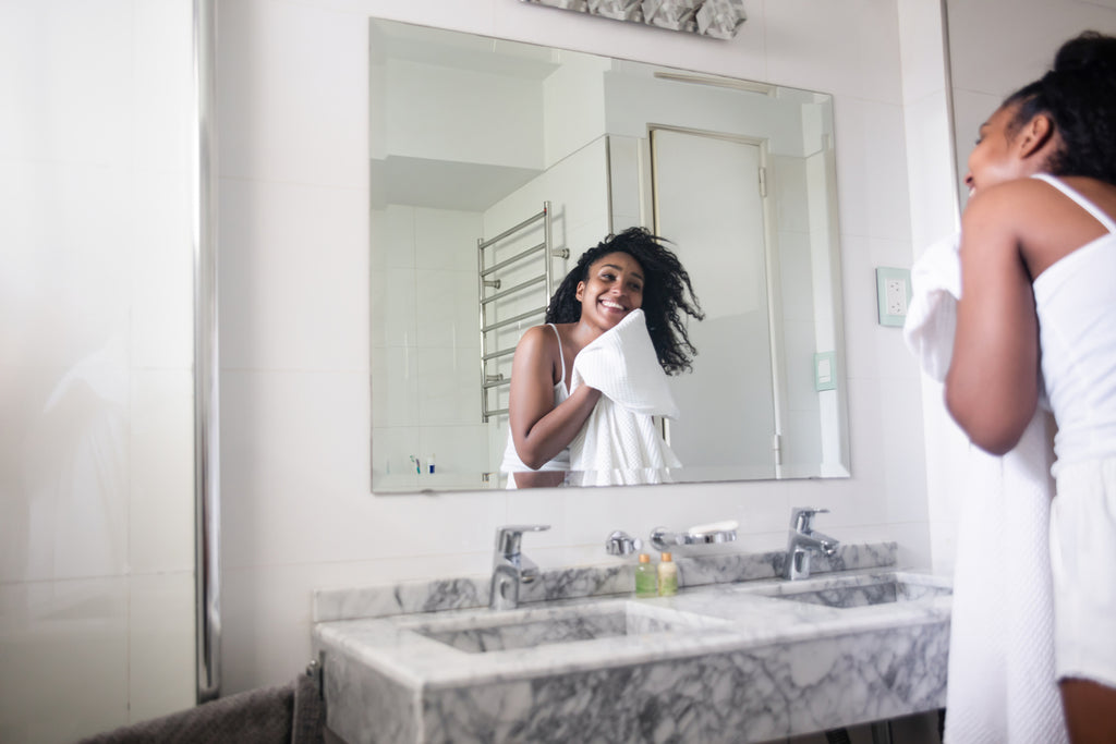 person drying hair