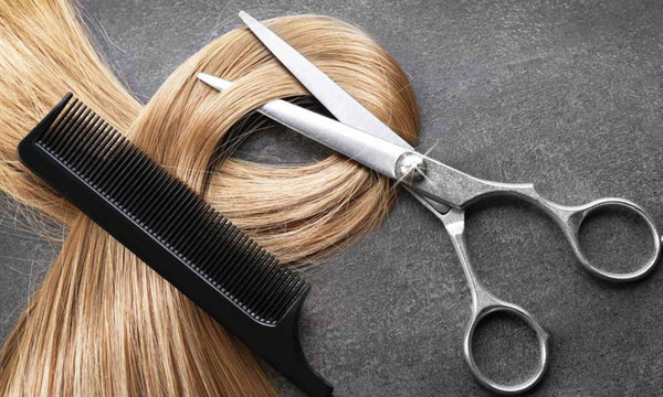 picture of hair with comb and scissors