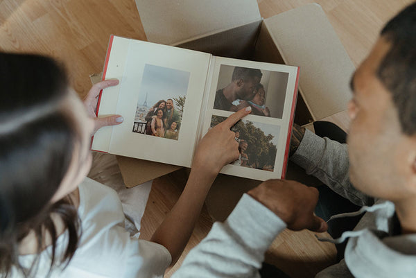 couple looking at a memory book