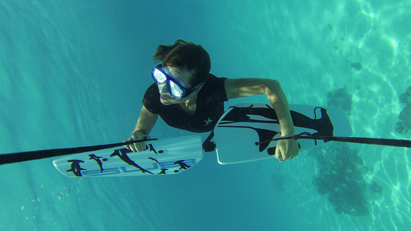 woman doing barrel roll on the subwing