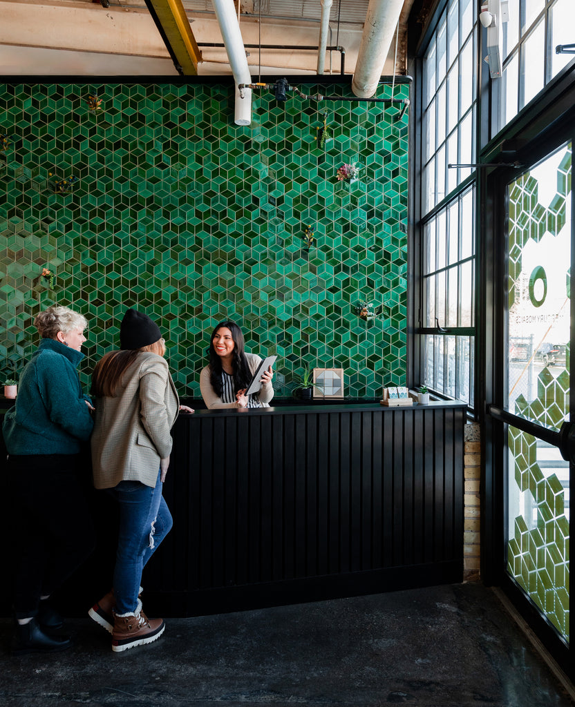 green diamond tile reception wall