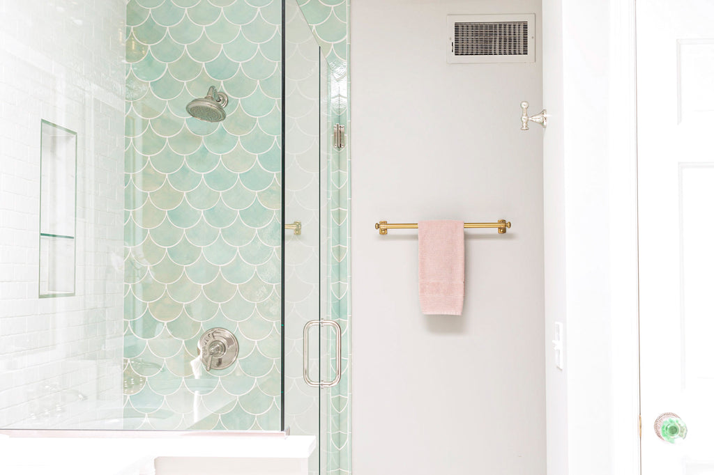 Light teal fish scale tile shower