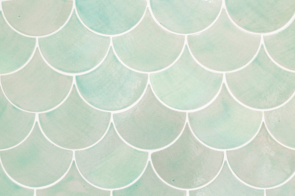 Light teal fish scale tile shower