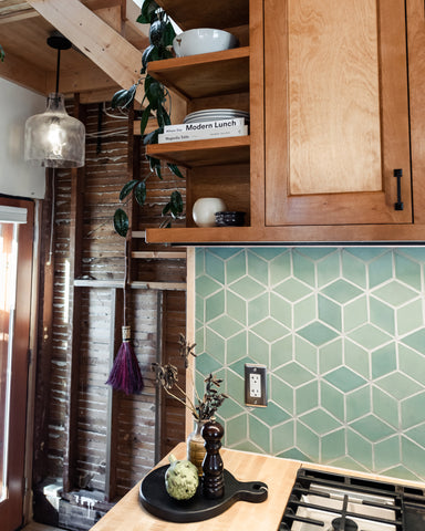 Rustic sage green kitchen tile backsplash