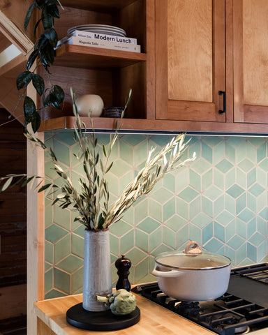 Rustic sage green kitchen tile backsplash
