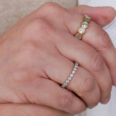 Pratima Sethi wears the Sethi Couture Bezel White Diamond Band alone as a solo stacking ring