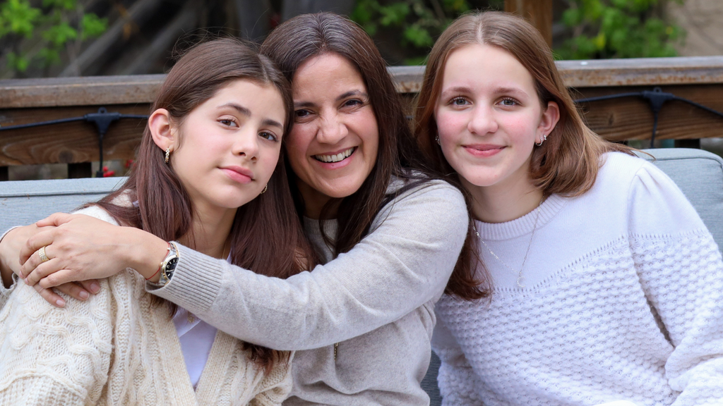 Pratima shares an embrace with her daughters Sienna and Amelie