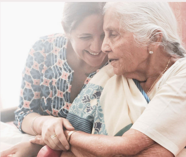 Pratima Sethi smiles and embraces her grandmother