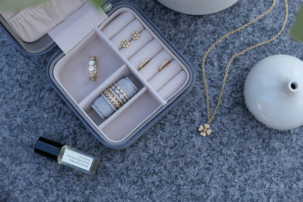 Pratima's Sethi Stack, Camelia White Diamond Earrings, Modern Bezel White Diamond Huggies and Clover White Diamond Charm