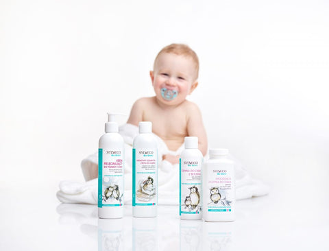 Baby sitting with Sylveco for Baby skincare cosmetics