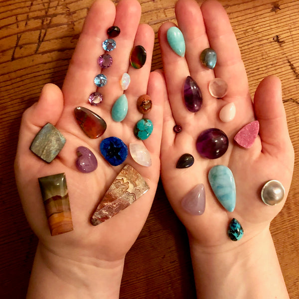 Handful of gemstones by Mikel Grant Jewellery