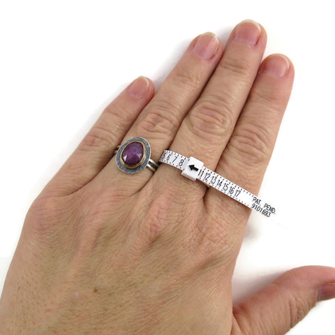 Adjustable ring gauge shown in use by Mikel Grant Jewellery