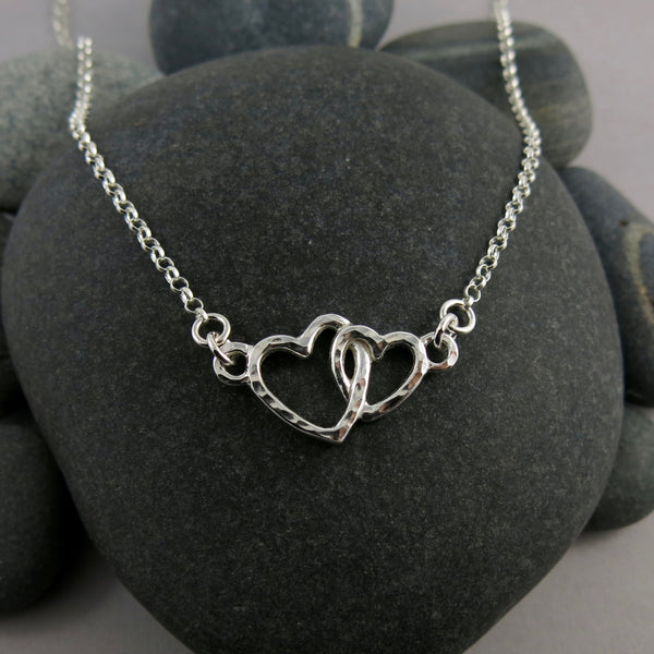 Mother and child necklace in sterling silver by Mikel Grant Jewellery