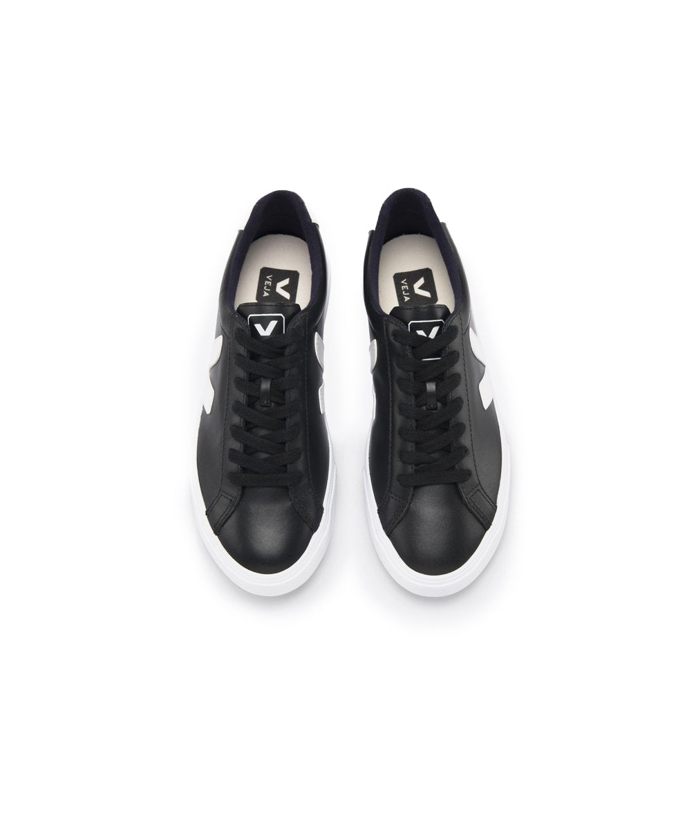 black leather white sole shoes