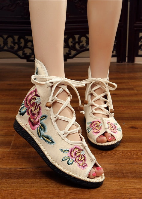 white embroidered shoes