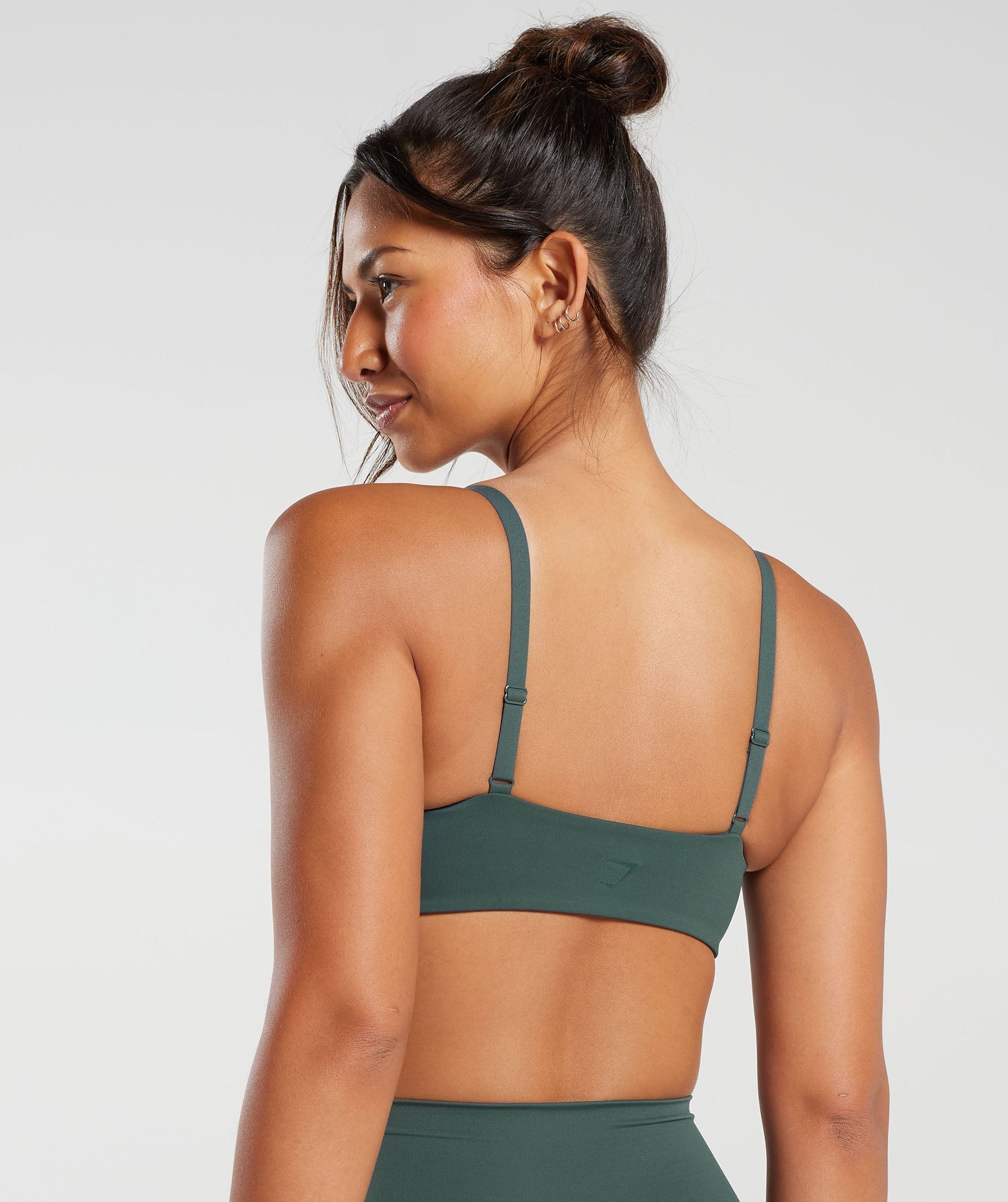 Evolve Multiway Twist Front Sports Bra in Teal Green