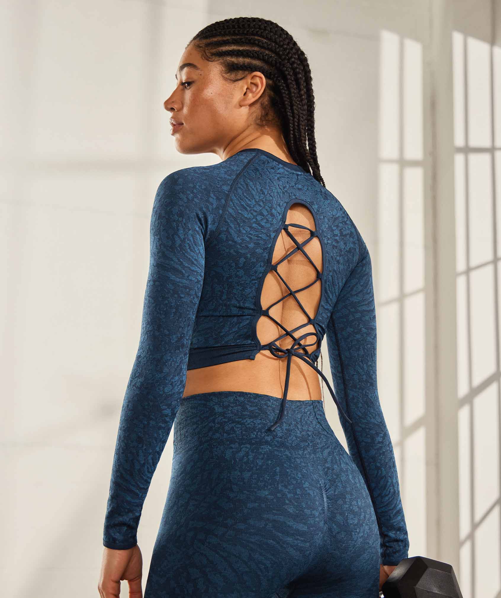 Adapt Animal Seamless Lace Up Back Top in Wild | Navy