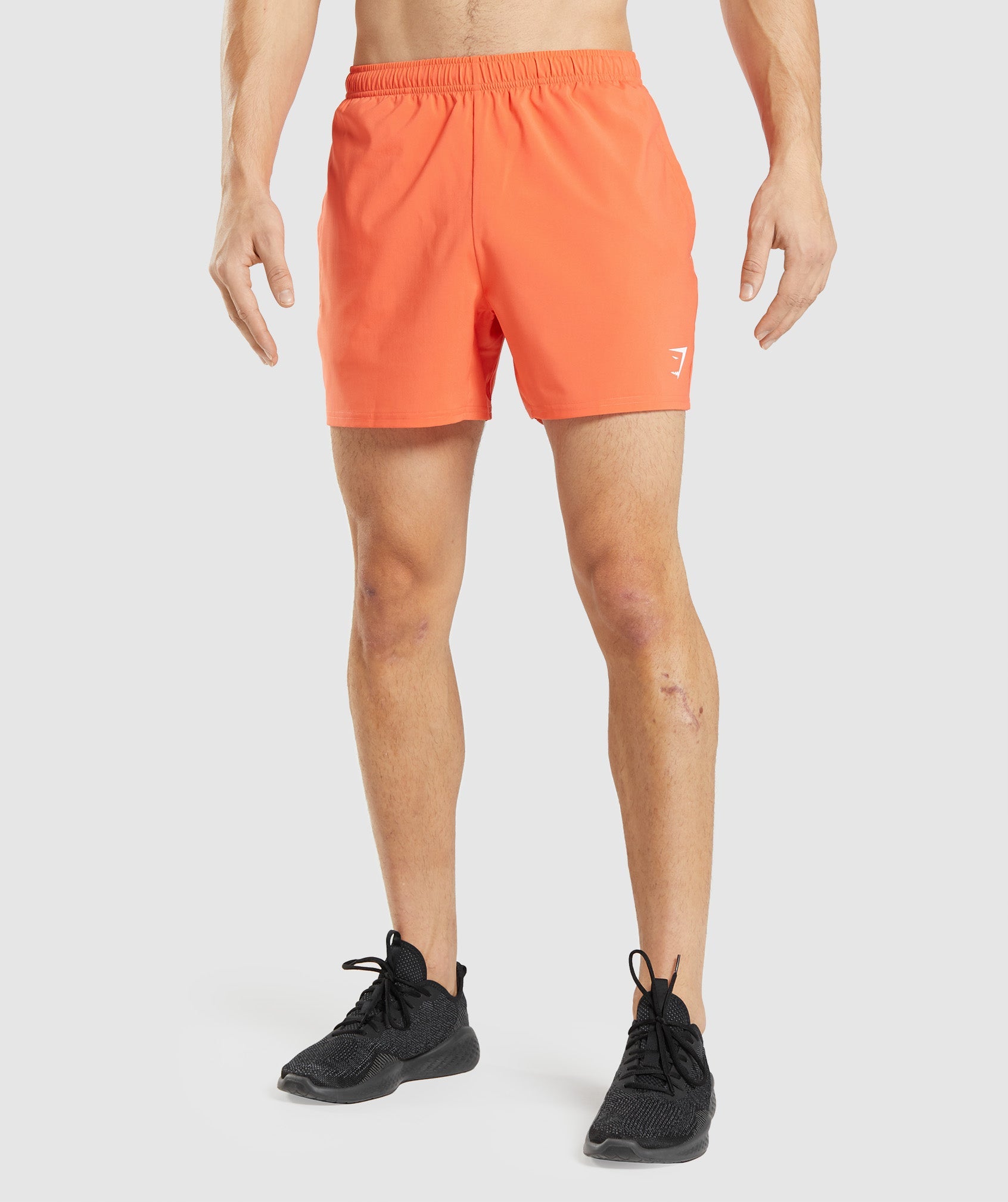 Arrival 5" Shorts in Papaya Orange