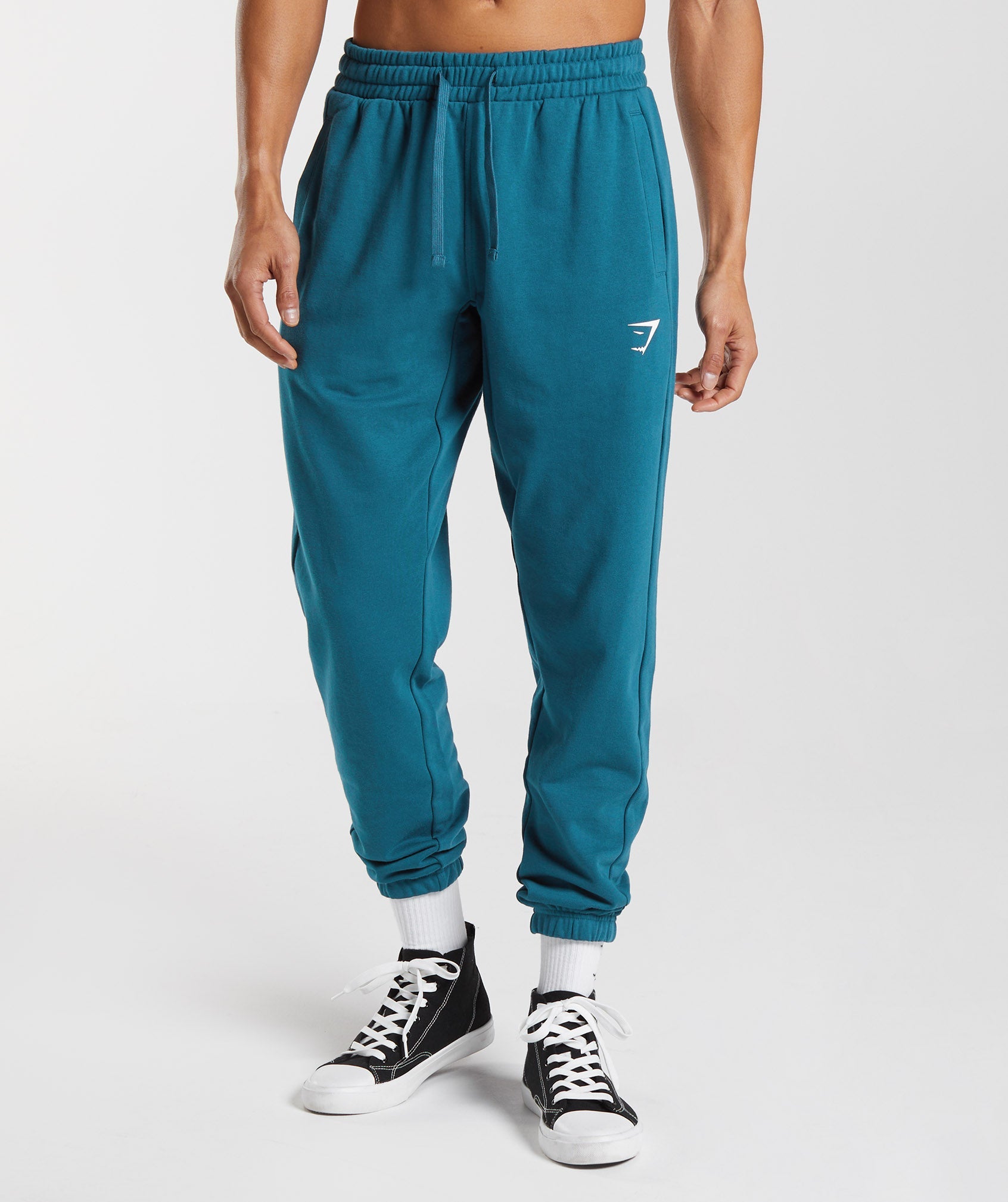 Gymshark Crest Joggers, Men's Fashion, Bottoms, Joggers on Carousell