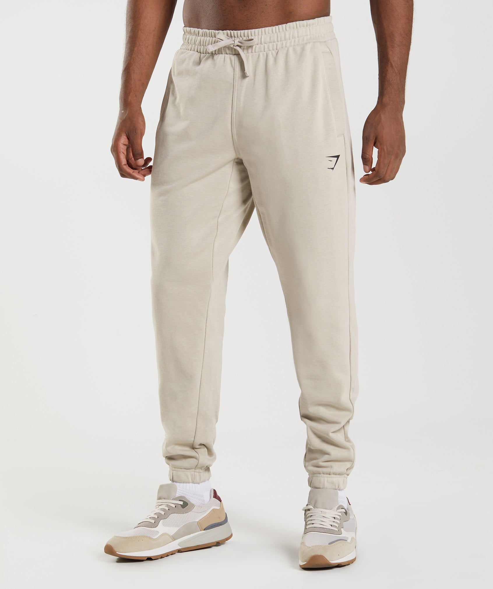 Gymshark Men's Crest Joggers Sweatpants in Light Grey Slim Fit