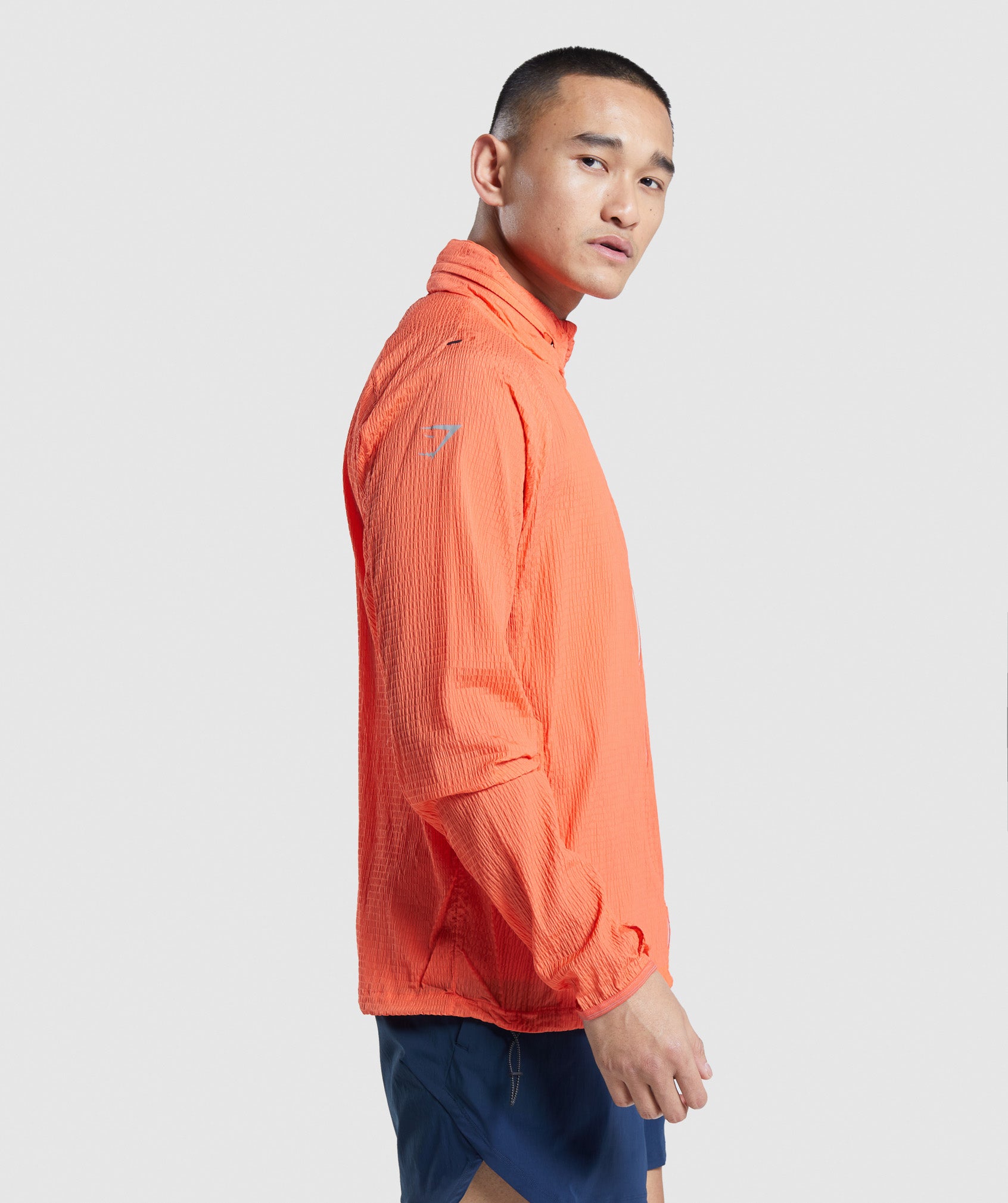 Speed Evolve Windbreaker in Papaya Orange