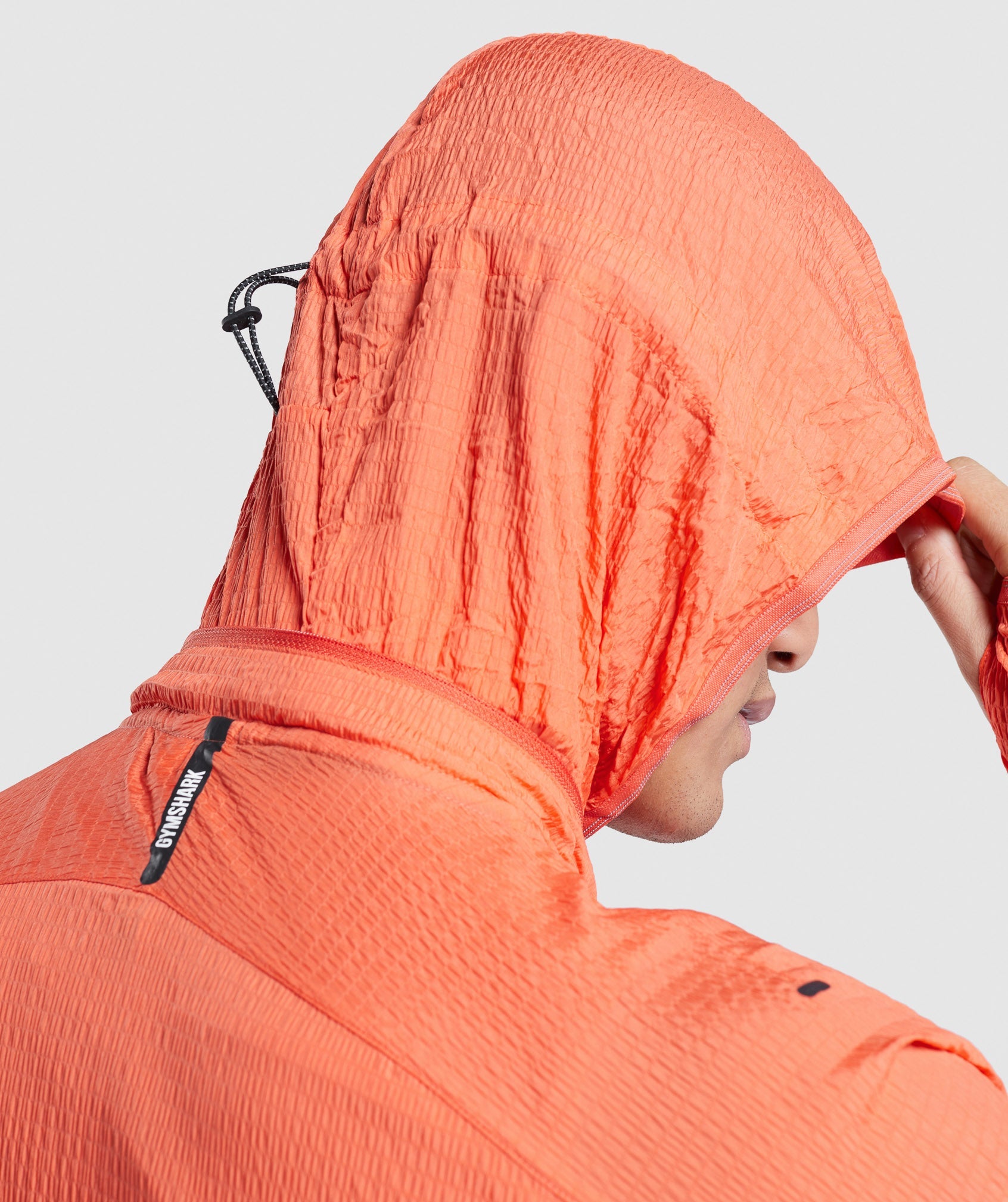 Speed Evolve Windbreaker in Papaya Orange