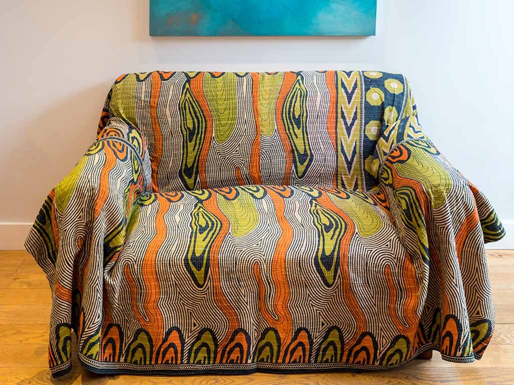 Kantha Quilt on a Chesterfield style sofa