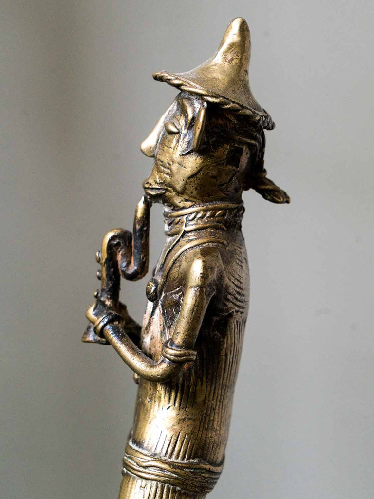 Brass Sculpture of an Indian Saxophone Player 1