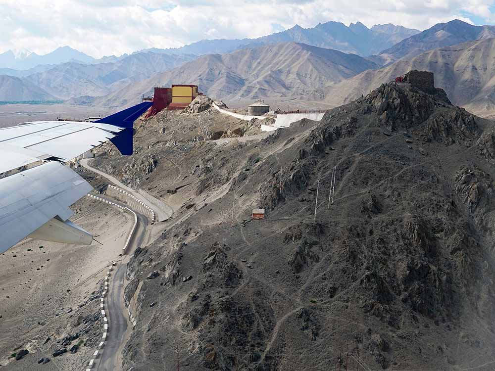Flying past Spituk monastery before landing at Leh
