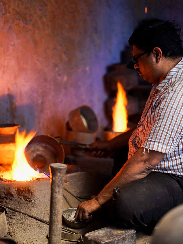 Making metal water pots in Wadhwan, Gujarat