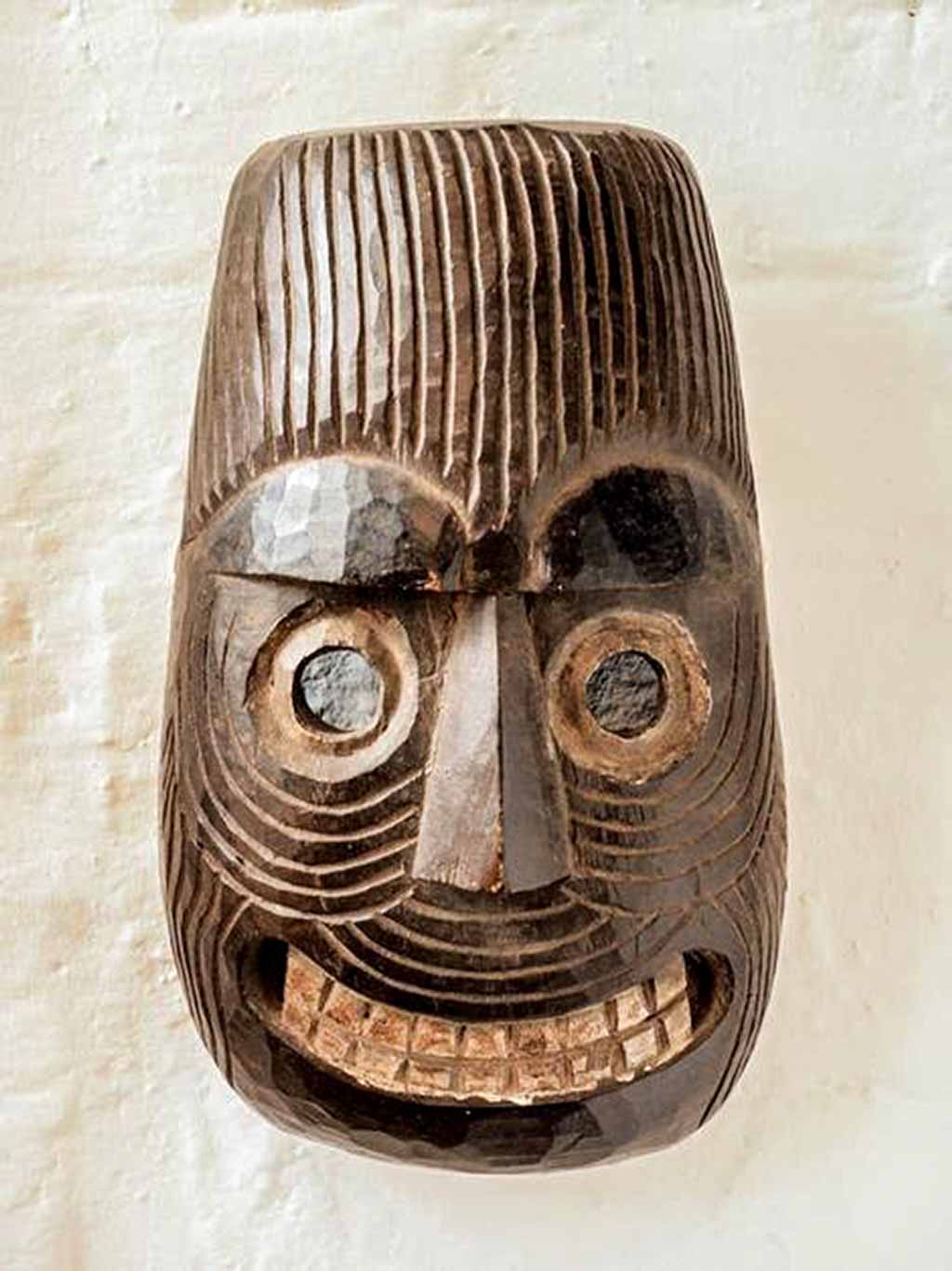 Grinning-wooden-mask from Nepal