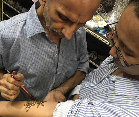 The printing block maker also does henna tattoos