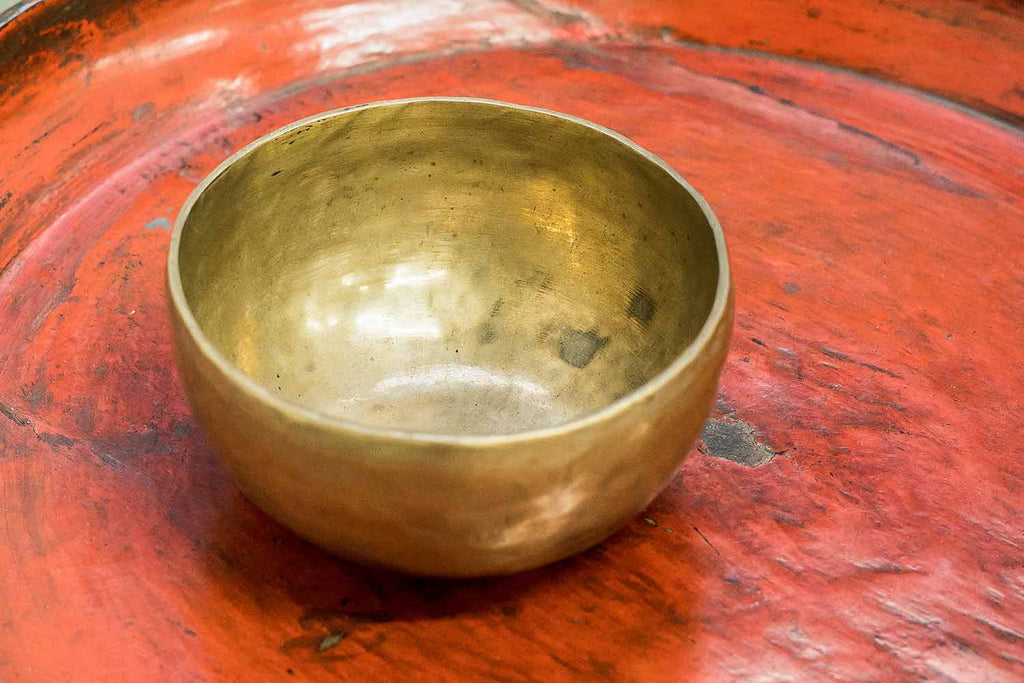 Tibetan Singing Bowl on Red Lacquererd Tray