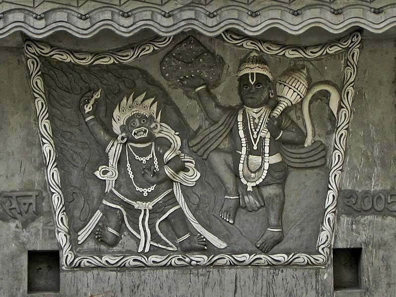 carved wooden vajrapani and hanuman