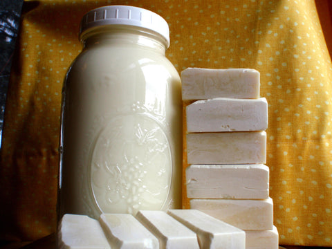 jar of milk next to bars of soap