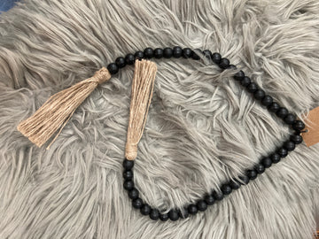 black beads with tassel