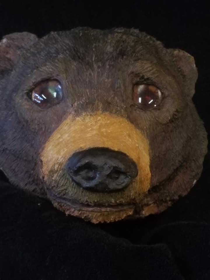 brown bear sculpture with animated glass teddy bear glass eyes