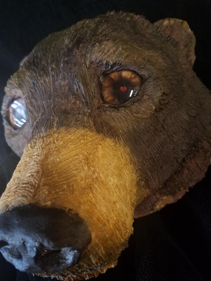 bear sculpture with animated glass teddy bear heart eyes