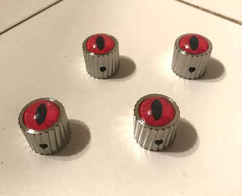 steel instrument volume knobs with glass eyes