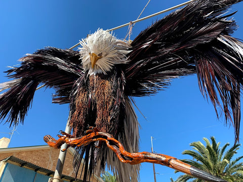 huge palm tree eagle sculpture
