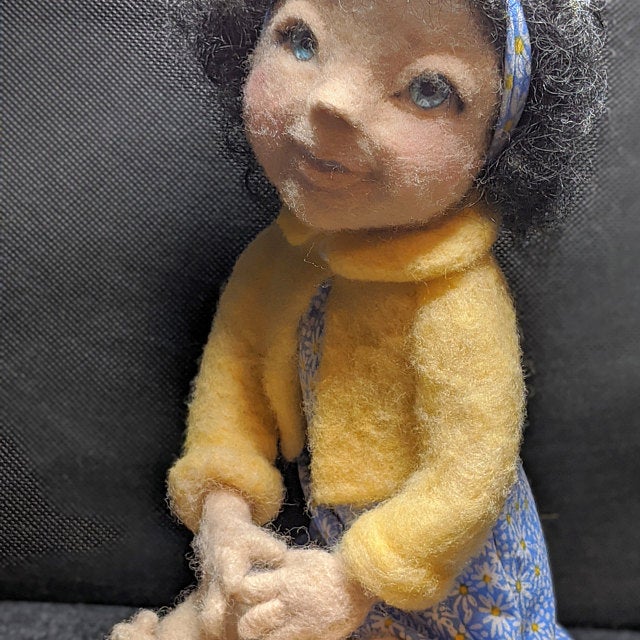 Needle felted doll with blue eyes