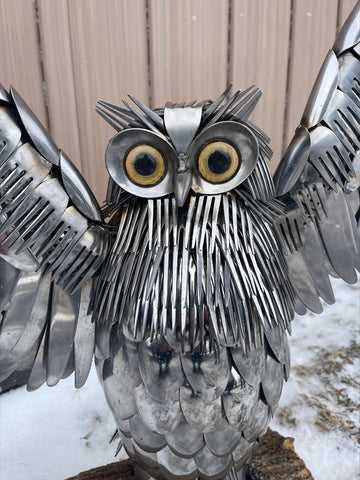 clever metal owl sculpture