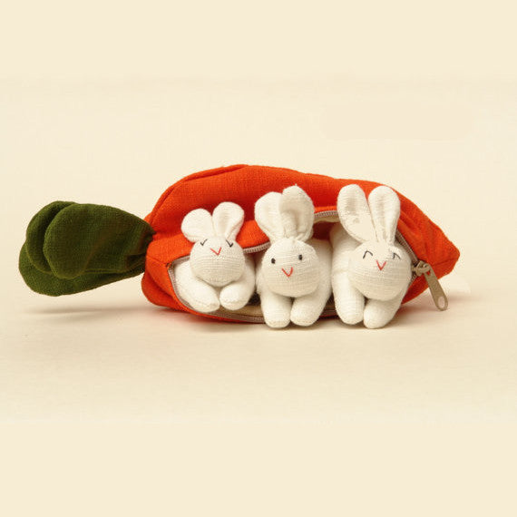 three bunnies in a carrot purse