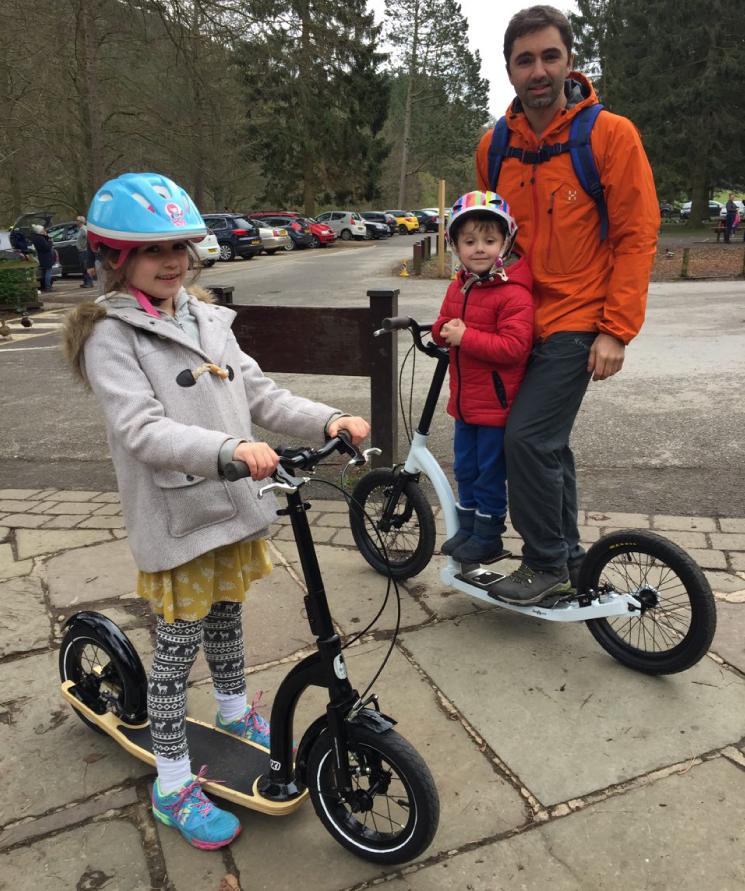 child on scooter