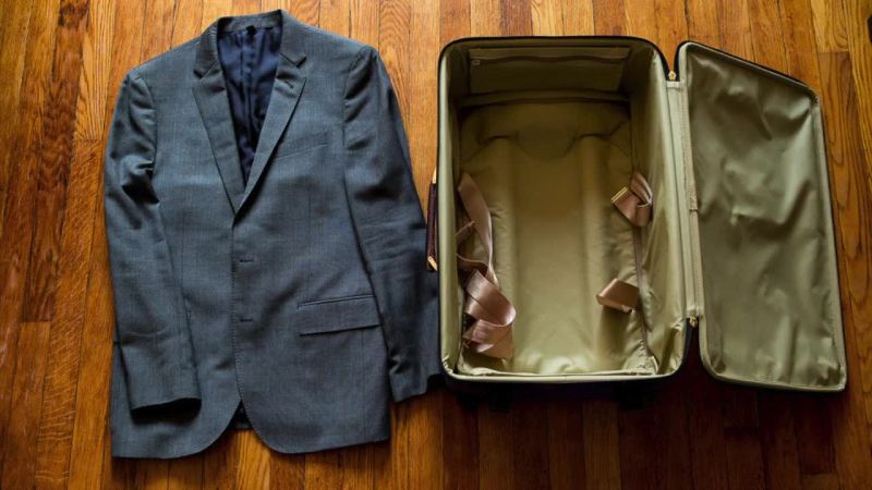 how to pack a suit in a suitcase 