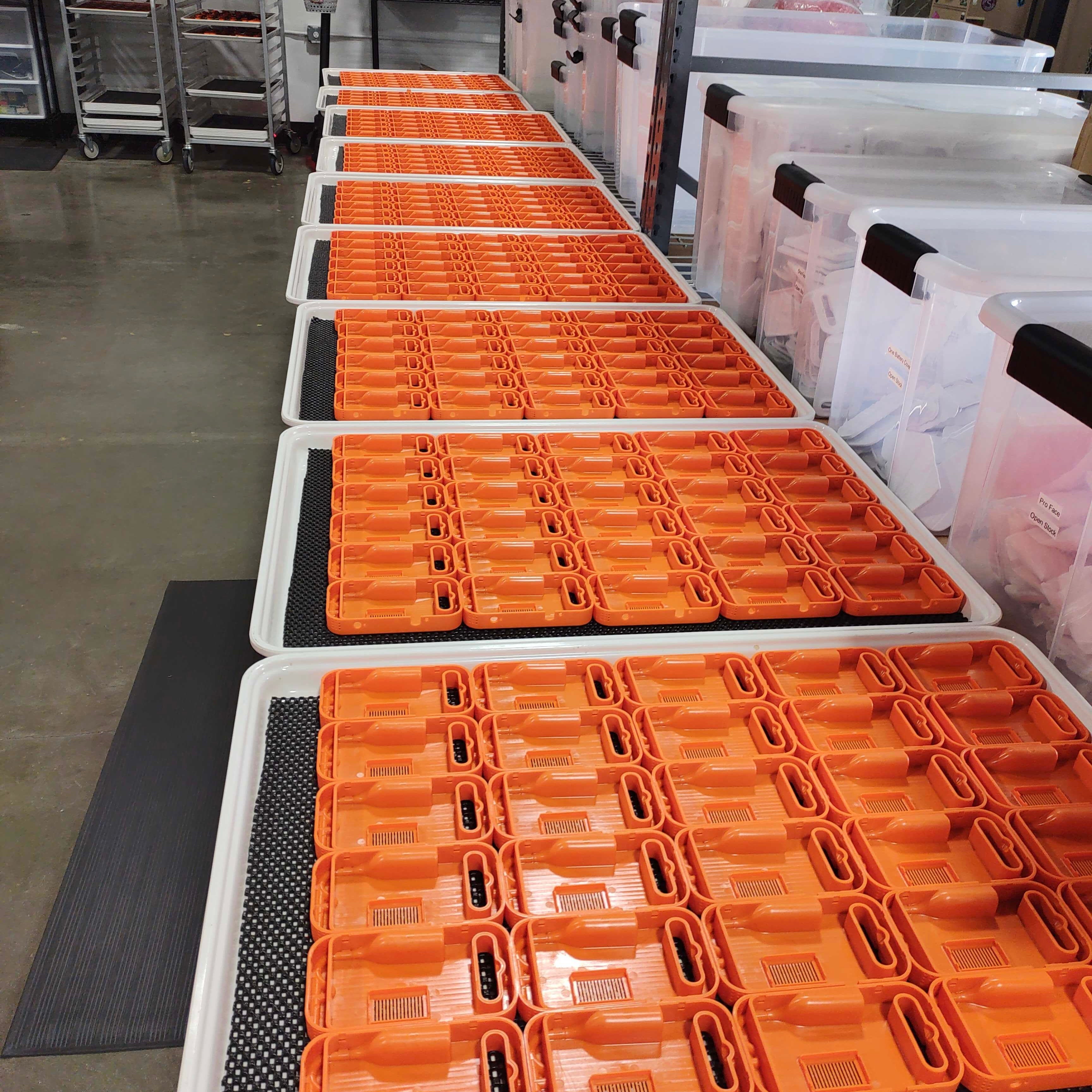 rows and rows of Pulse Pro outer casing during assembly