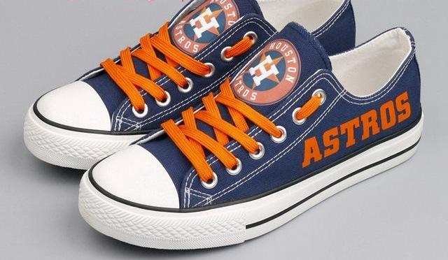 orange astros converse