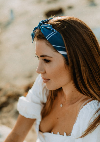 a woman with a blue headband