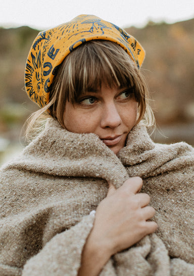 a person wearing a yellow hat