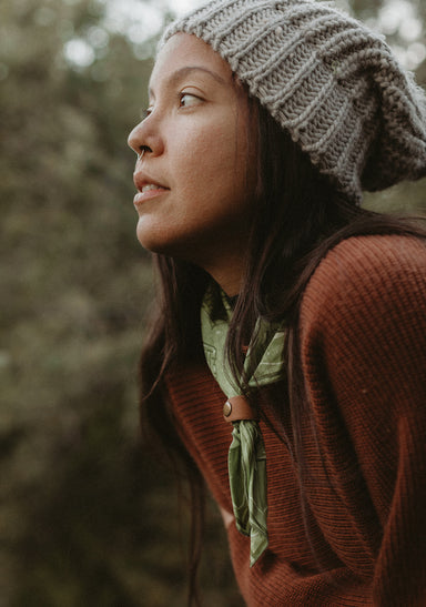 a woman with a scarf on her head